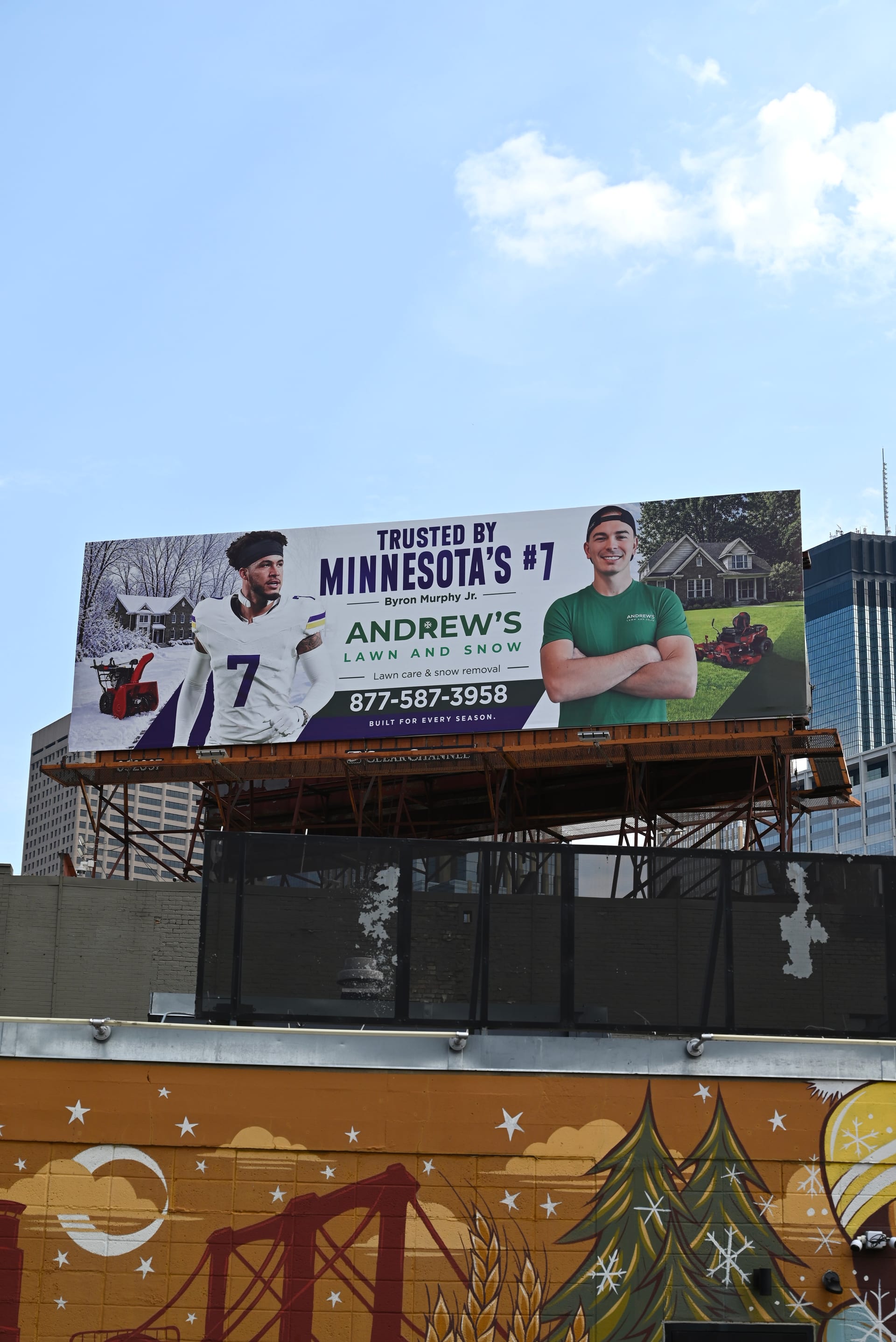 Andrew's Lawn and Snow billboard at Central Ave NE and Broadway St NE