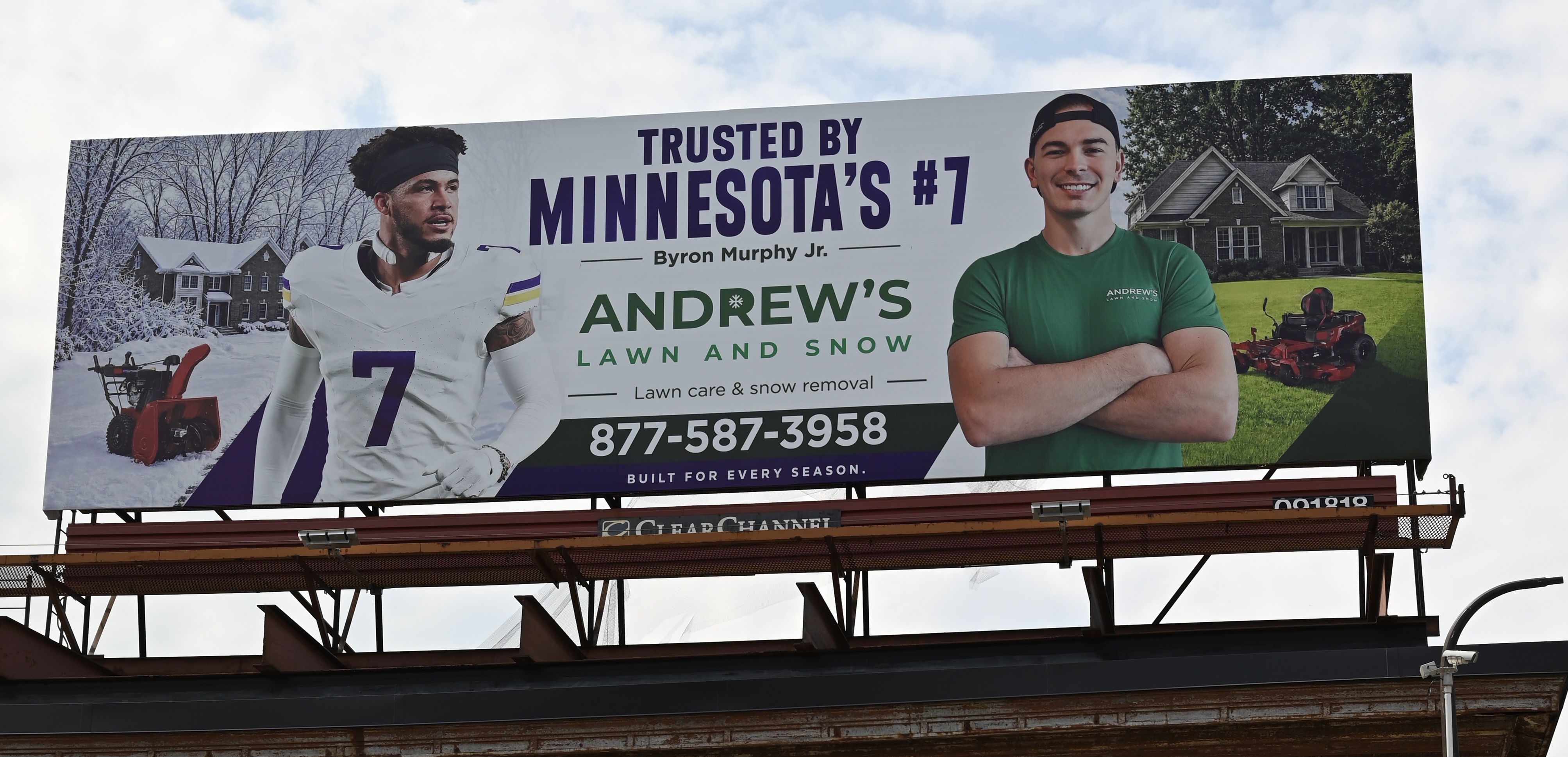 Andrew's Lawn and Snow billboard at Dunwoody Boulevard and Maple Street S